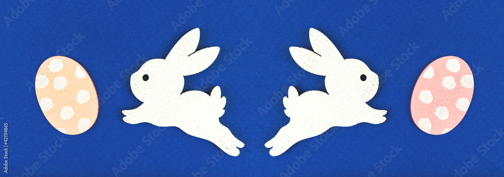 Easter bunny with easter egg festive banner, top view and flat lay Easter bunny with easter egg festive banner, top view and flat lay
