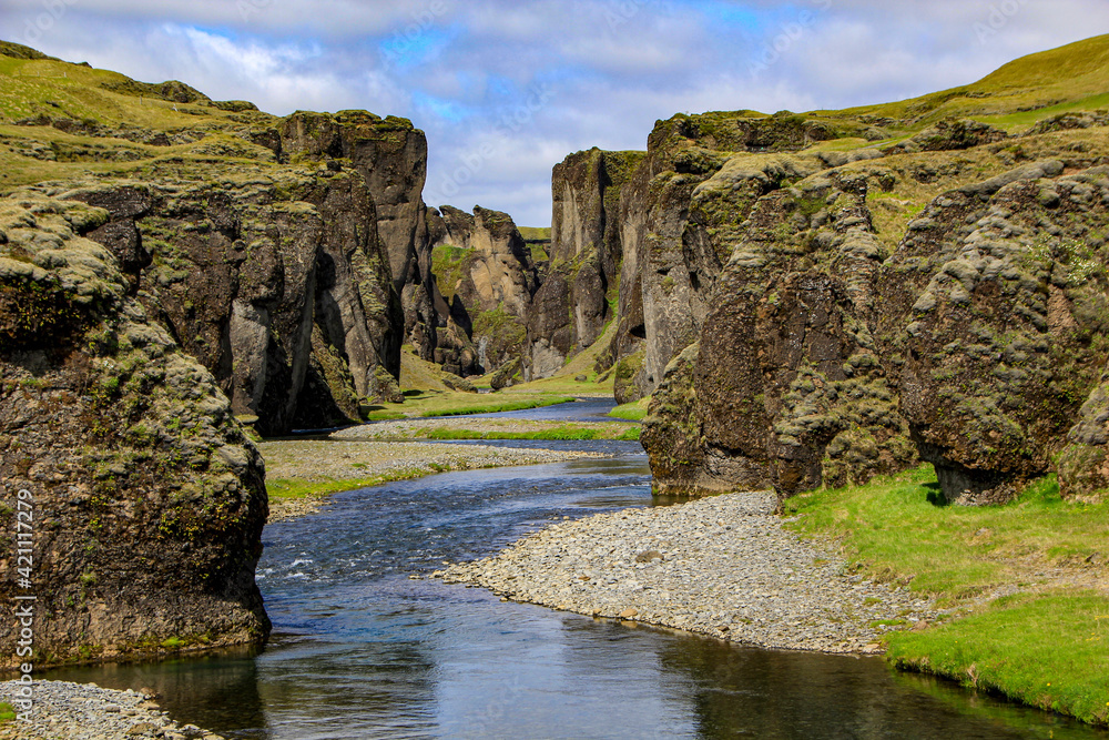 River flowing through beautiful Fjadrargljufur canyon, near Kirkjubaejarklaustur, Iceland