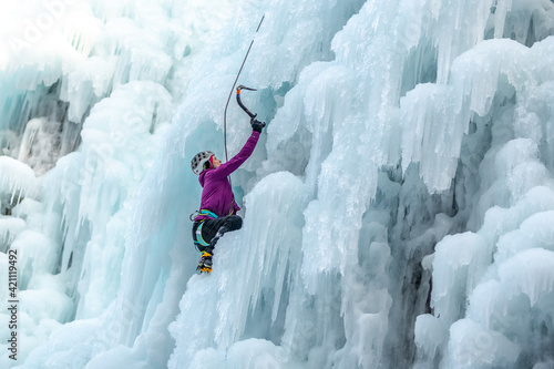 Ice climb with ice-axe and rope