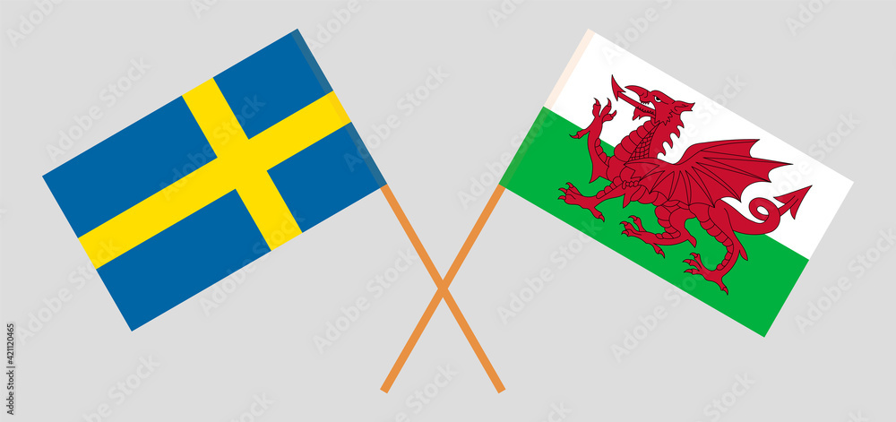 Crossed flags of Sweden and Wales. Official colors. Correct proportion