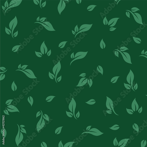 Seamless decorative backgroung with different green leafs.