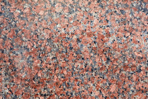 The texture of natural polished granite. Pattern, background. © Maya