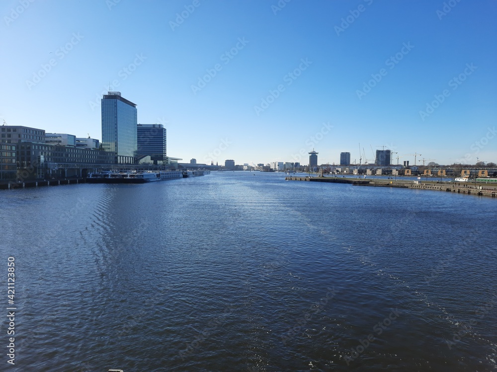 View from bridge at Oostelijke handelskade and Java Eiland in Amsterdam