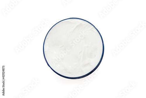 face cream in a jar on a white background.
