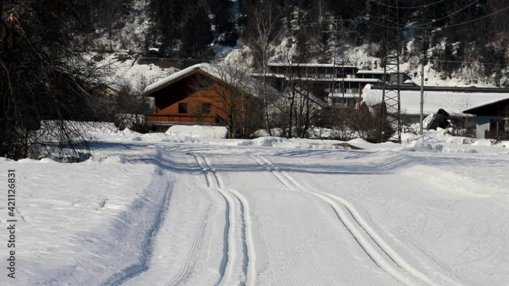 Skiing bunny slope in an Austrian village
Skiing bunny slope in an Austrian village