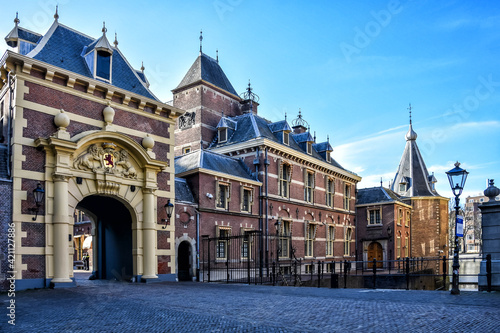 Entrance gate to the parliament building, Binnenhof, with a view to the right of the tower, being the office of the Prime Minister, The Hague, The Netherlands, Holland, Europe