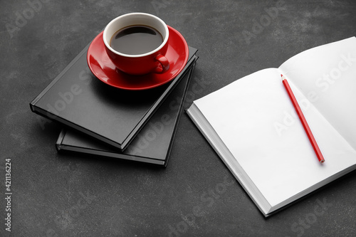 Composition with books, pen...