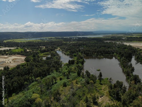 The Nepean River Weir at Penrith with surrounding bushland.