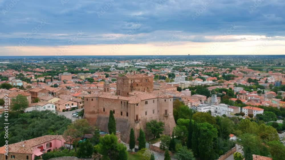 AERIAL: Tuscany town during sunset. Flyover drone shot of a fortress with views of the Italian landscape. AERIAL: Tuscany town during sunset. Flyover drone shot of a fortress with views of the Italian landscape.