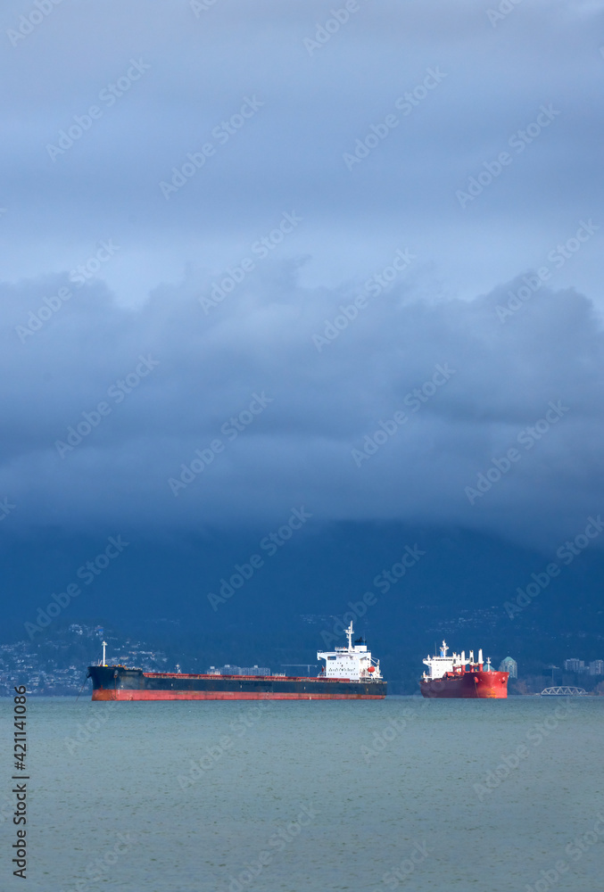 English Bay Freighters Storm Clouds. Freighters under storm clouds in English Bay.

