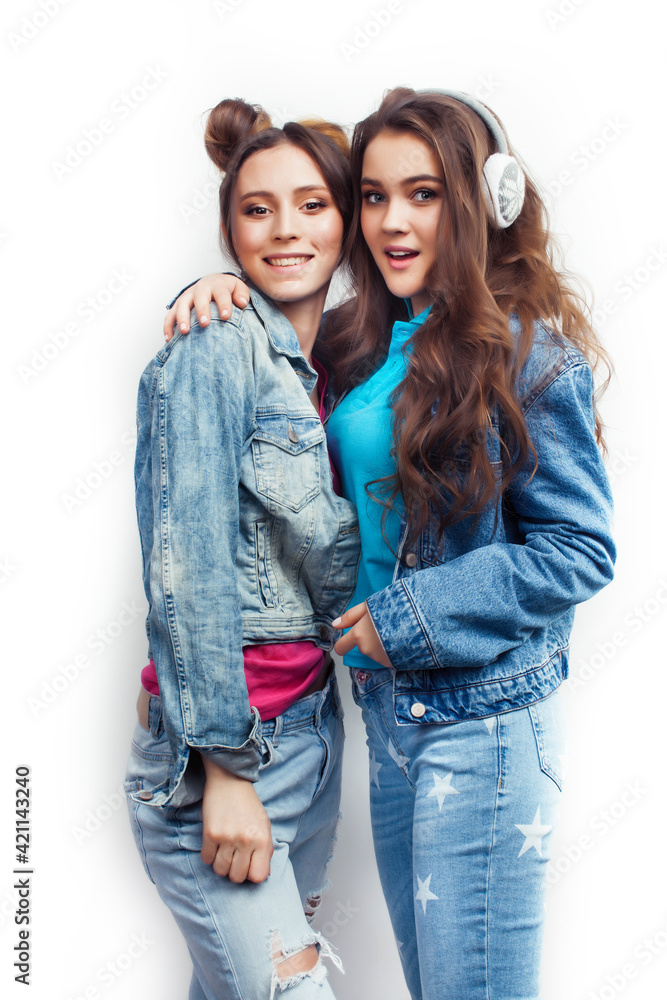 lifestyle and people concept: Fashion portrait of two stylish sexy girls best friends, over white background. Happy time for fun lifestyle and people concept: Fashion portrait of two stylish sexy girls best friends, over white background. Happy time for fun