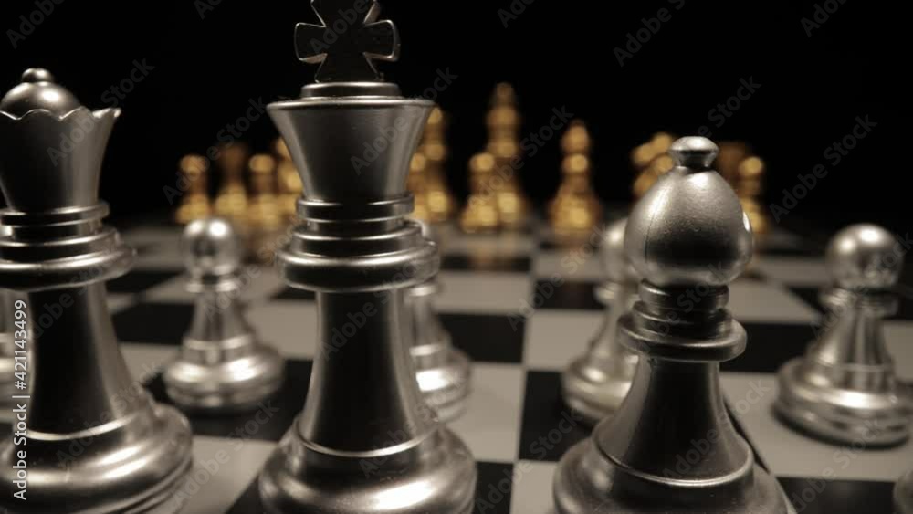 A chessboard in close-up - sliding shot - macro view A chessboard in close-up - sliding shot - macro view