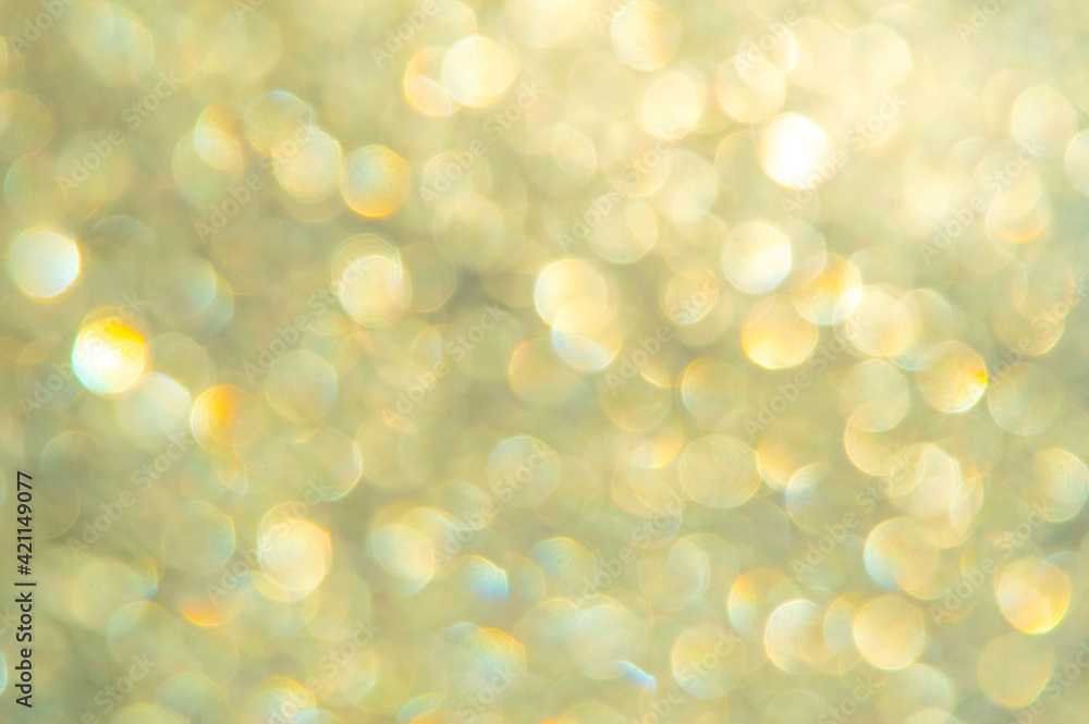 Obraz premium bright glitter background: bokeh effect from many colored lights on frozen glass, toning