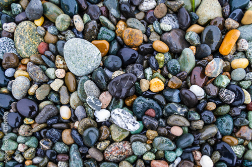 Colorful smooth rocks on the beach