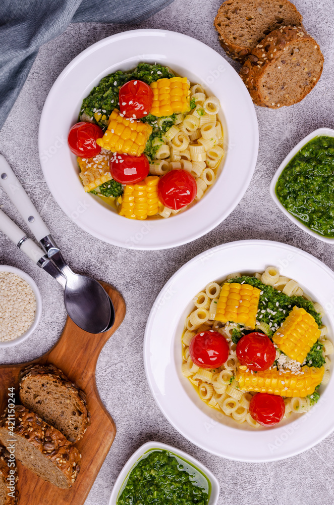 Pasta with vegetables and green sauce Pasta with vegetables and green sauce