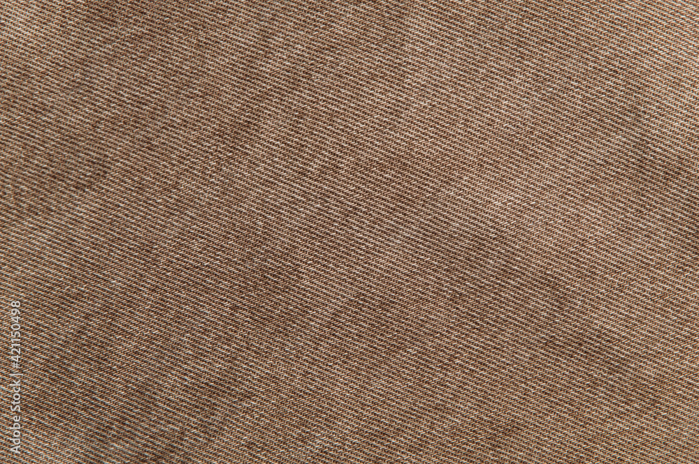 Fototapeta premium fabric grunge background, real cotton denim brown, wrinkled, frayed, close