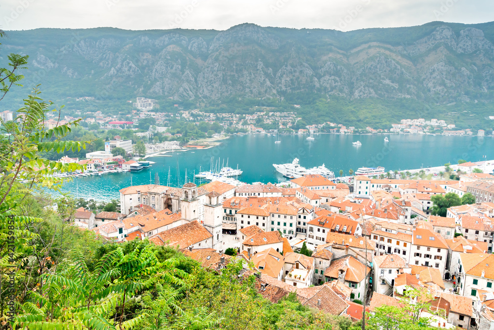 Kotor Bay and terracotta tiled rooftops viewed from above the Old Town,Kotor,Montenegro.