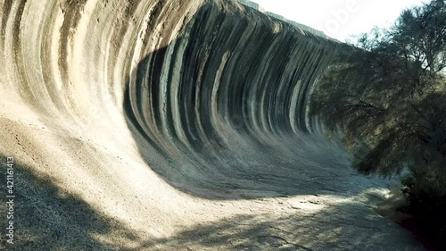 Close Up Of Wave Rock (Hyden Rock) - Natural Rock Formation Shaped Like A Tall Breaking Ocean Wave In Hyden, Australia. - Dolly Shot photo