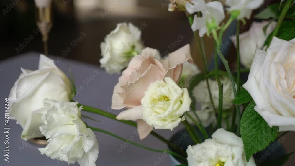Bouquet of rose flowers at the table. Pink and white. High quality FullHD footage Bouquet of rose flowers at the table. Pink and white. High quality FullHD footage