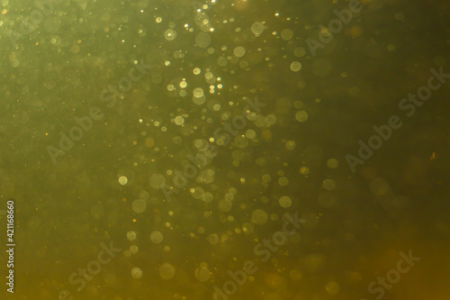 Abstract glitter gold bokeh