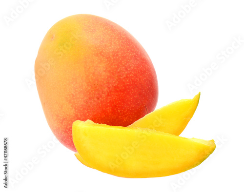 Ripe red yellow mango tropical fruit with slices closed up isolated on white