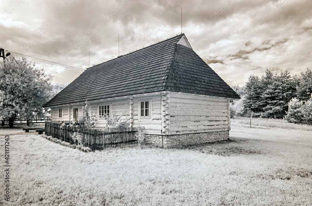 Old wooden hut. Infrared photo. Old wooden hut. Infrared photo.