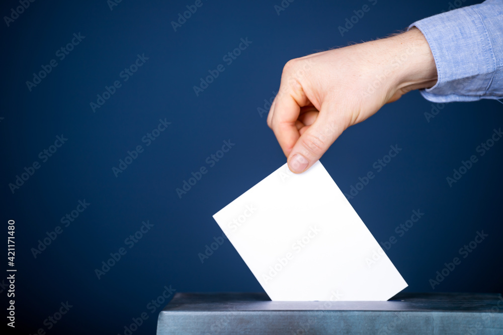 Voter Putting Ballot Into Voting box. Voter Putting Ballot Into Voting box.