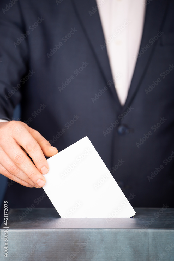 Voter Putting Ballot Into Voting box. Voter Putting Ballot Into Voting box.