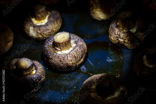 Baked mushrooms champignons in the oven.