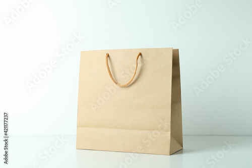 Blank paper bag on white background, space for text