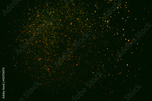Glittering stars of blur gold bokeh
