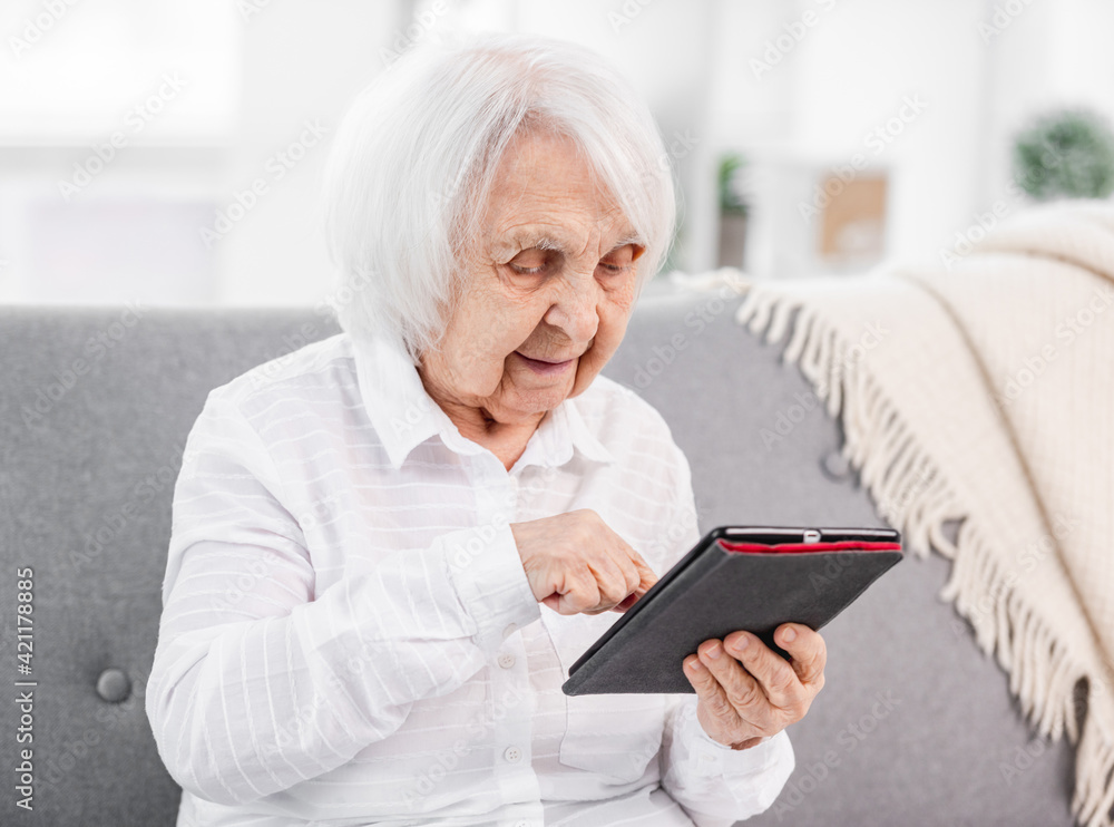 Elderly woman with tablet Elderly woman with tablet