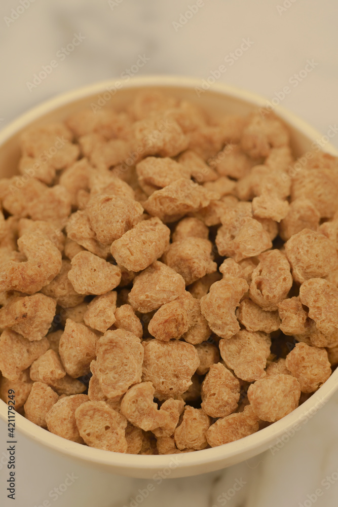 Closeup of textured soy protein. Textured vegetable protein. Soy meat for a vegan diet Closeup of textured soy protein. Textured vegetable protein. Soy meat for a vegan diet
