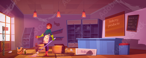Woman cleaning old dirty bakery shop