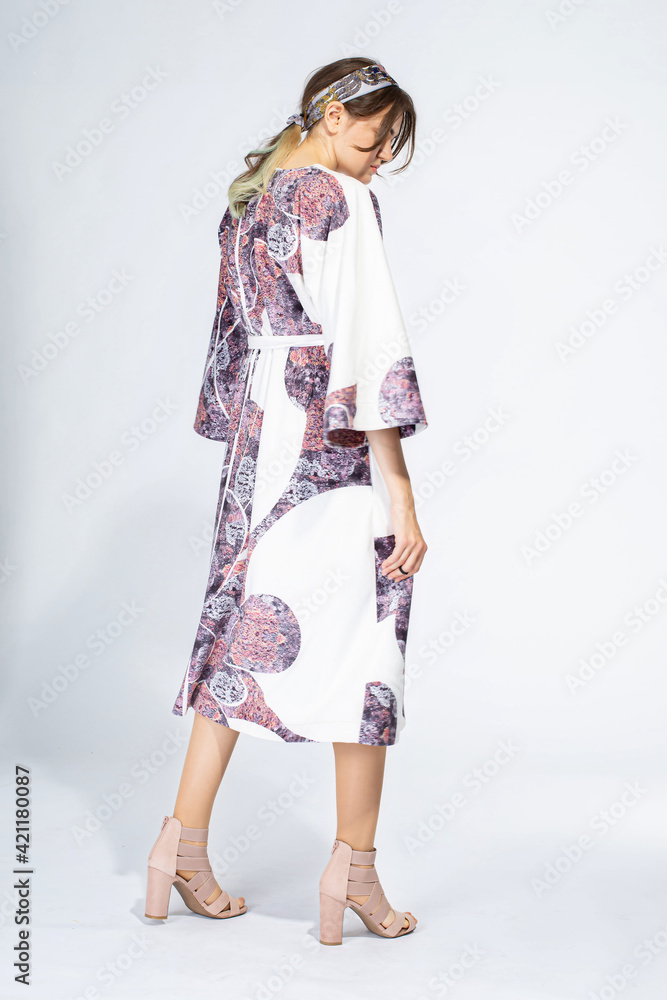 Young white woman isolated on light grey Young white woman isolated on light grey