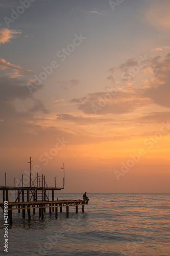 sunset on the pier © Vadim