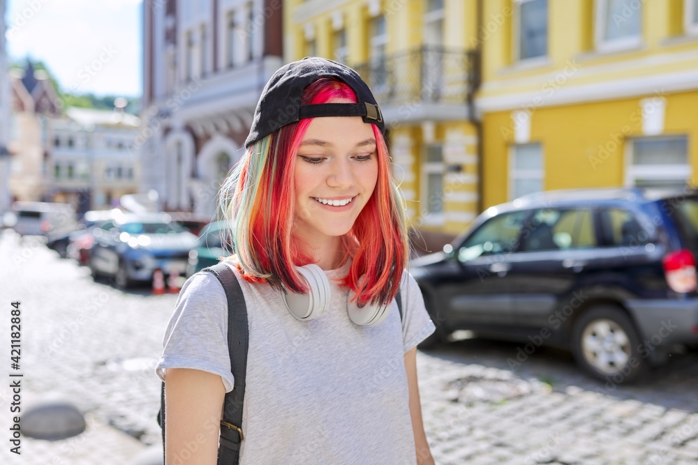 Outdoor urban portrait of a trending female teenager