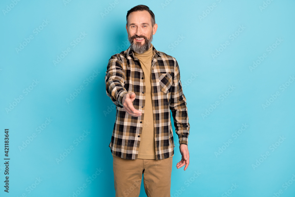 Fototapeta premium Photo portrait of aged man inviting laughing greeting nice to meet you isolated on bright blue color background
