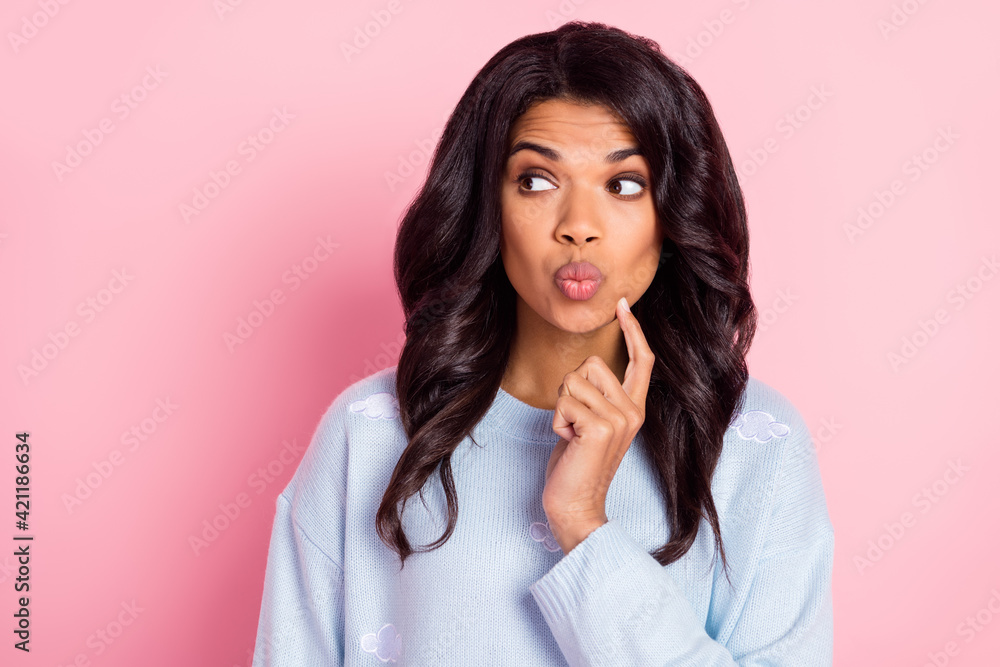 Photo of curious girl look side empty space forefinger cheek wear blue cloud print sweater isolated pink background Photo of curious girl look side empty space forefinger cheek wear blue cloud print sweater isolated pink background