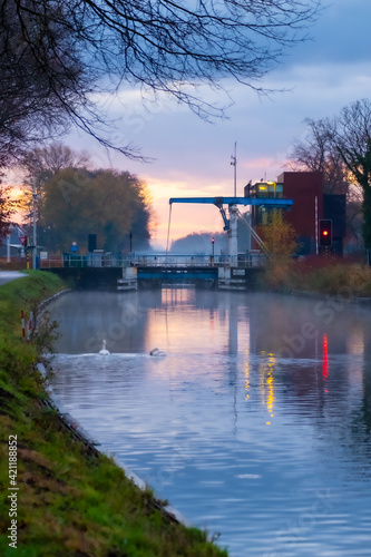 Vintage traditional drawbridge in Rijkevorsel Belgium at sunset. High quality photo