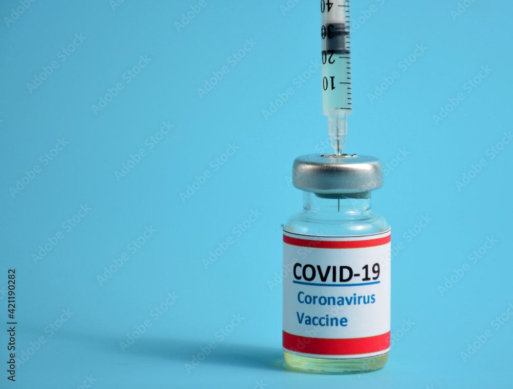 Vaccine on a blue background. Coronavirus. Vaccine on a blue background. Coronavirus.