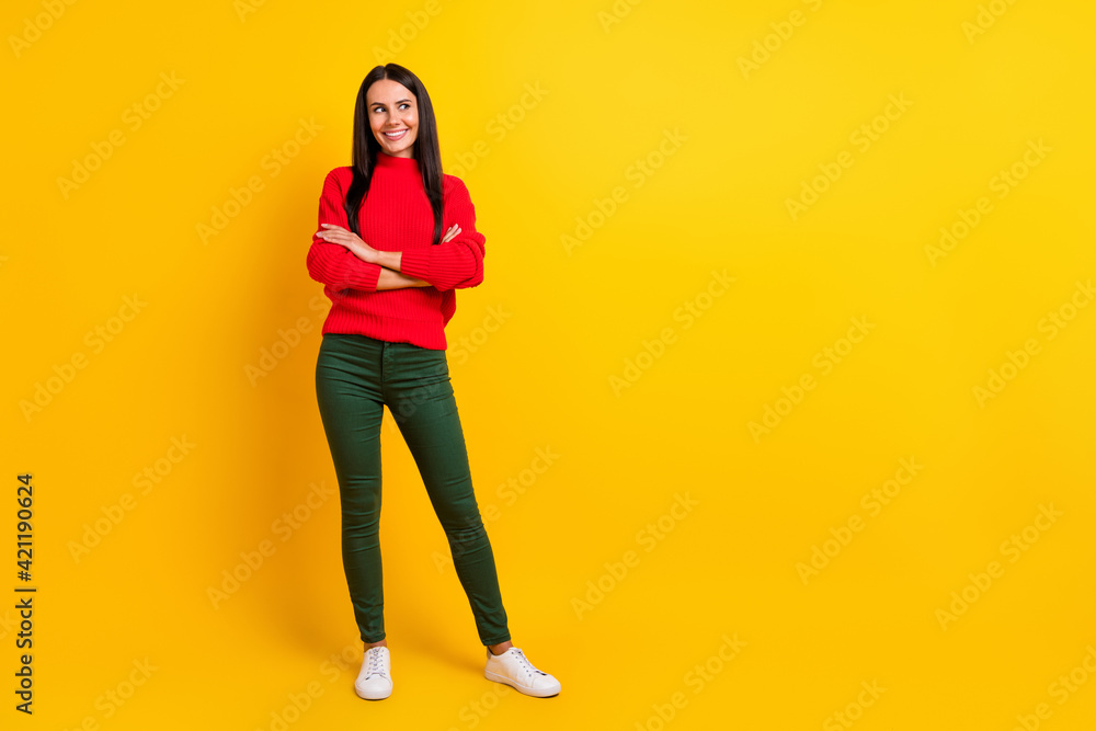 Full size photo of young charming smiling dreamy girl with folded hands look copyspace isolated on yellow color background Full size photo of young charming smiling dreamy girl with folded hands look copyspace isolated on yellow color background