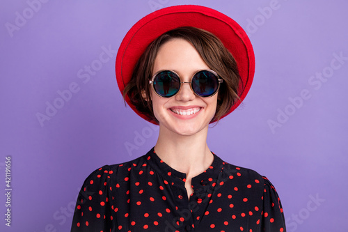 Close-up portrait of attractive cheerful glad girl wearing nice look specs isolated over bright violet purple color background