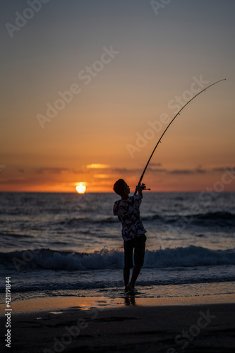 fishing at sunset © Vadim