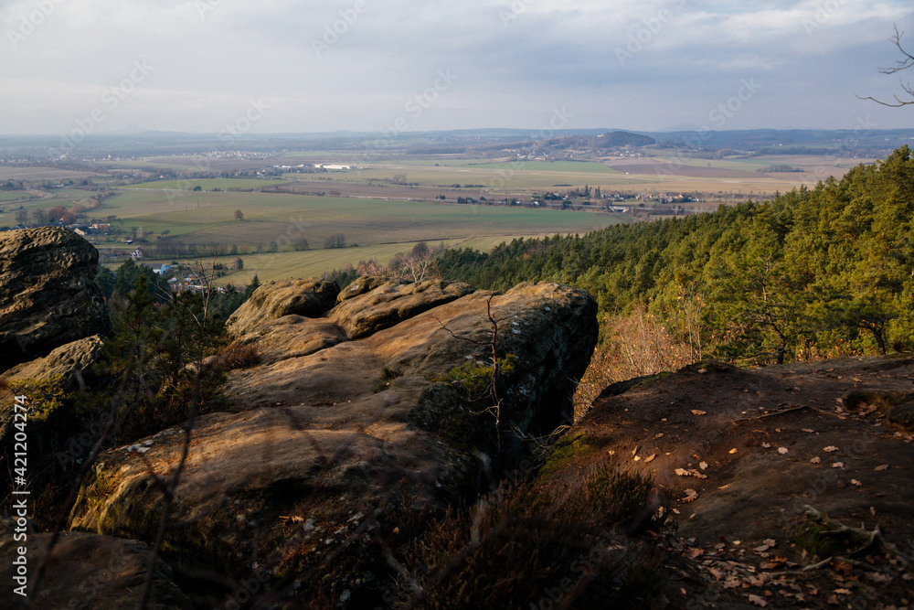 Aerial view from Drabske svetnicky, Autumn sandstone landscape of Bohemian Paradise in sunny day, winter at rock formation, Sandstone cliffs, colorful trees, nature National Park, Czech Republic