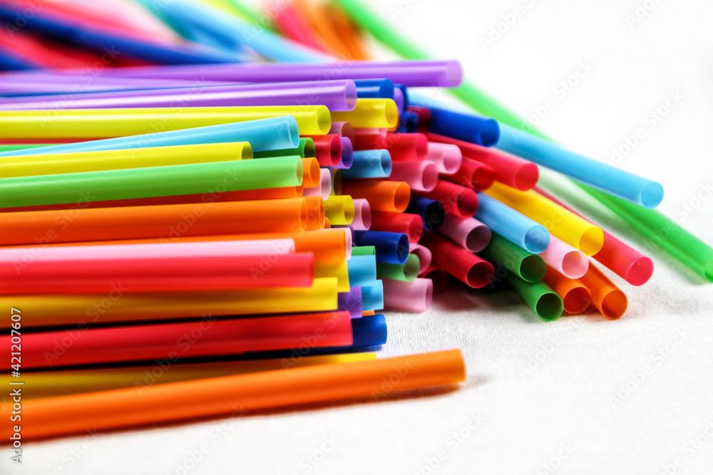 Colorful plastic drinking straws close up Colorful plastic drinking straws close up