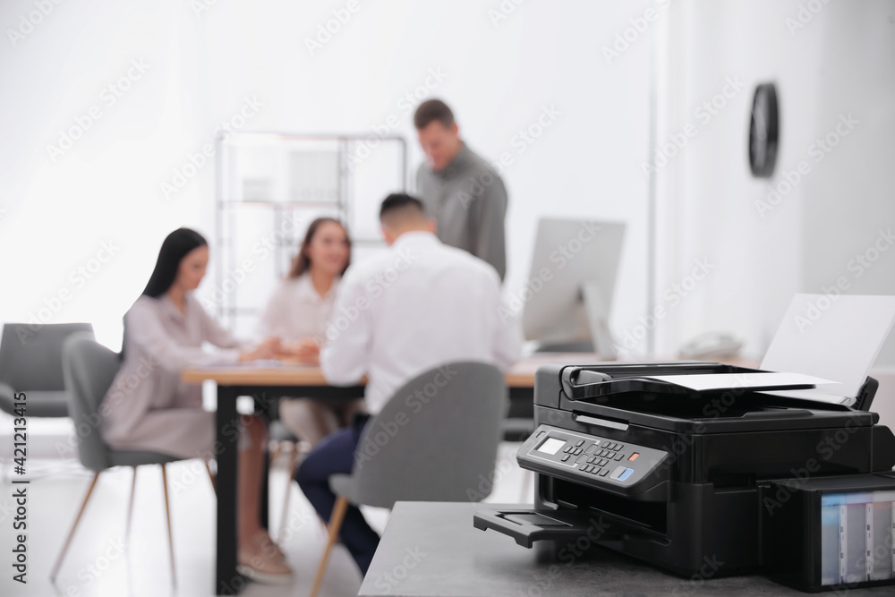New modern printer on table in office. Space for text New modern printer on table in office. Space for text