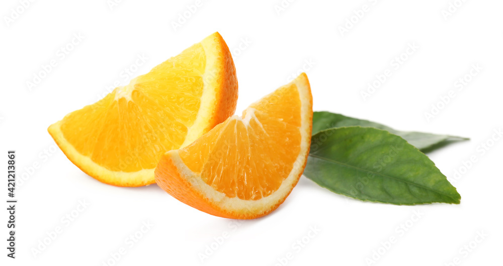 Slices of fresh ripe orange with green leaves on white background Slices of fresh ripe orange with green leaves on white background