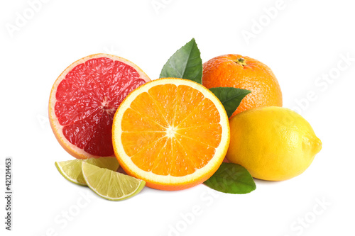 Fresh juicy citrus fruits with green leaves on white background