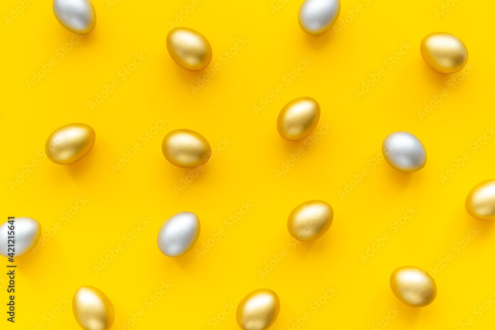 Happy Easter card with golden and silver eggs, top view Happy Easter card with golden and silver eggs, top view